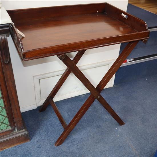 A Victorian mahogany butlers tray on folding stand W.77cm